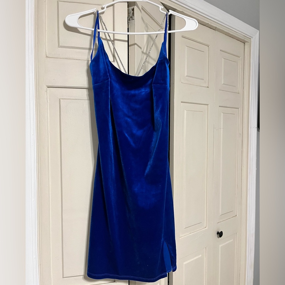 Beautiful velvet party dress with silver sparkle straps.